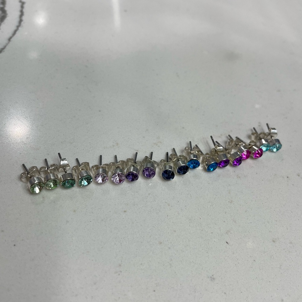 9 pairs of colored earrings